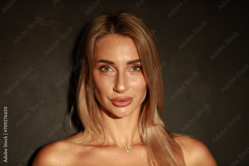 Portrait of beautiful blonde woman low key Portrait of beautiful blonde woman low key