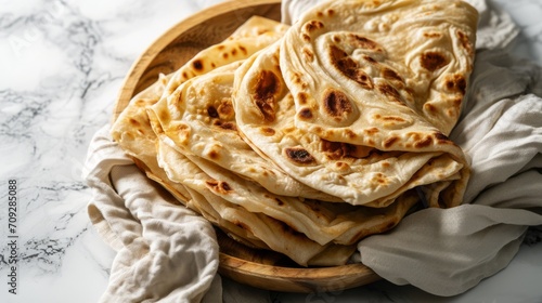 Roti canai. traditional  pan fried flat bread, Freshly baked indian flatbread photo