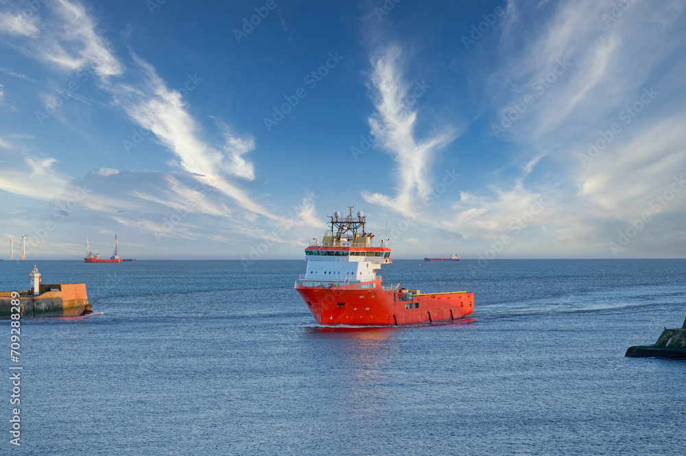 Ship arriving at Aberdeen harbour after passing Girdle Ness Lighthouse Ship arriving at Aberdeen harbour after passing Girdle Ness Lighthouse