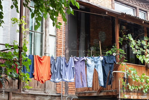 a colorful courtyard in the old part of Tbilisi with laundry