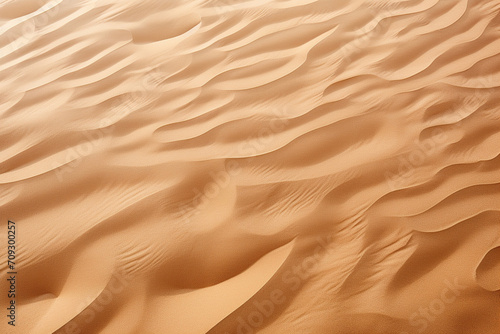 Wavy sand background. Sand texture in the desert or on the beach. Generative AI © Vovmar