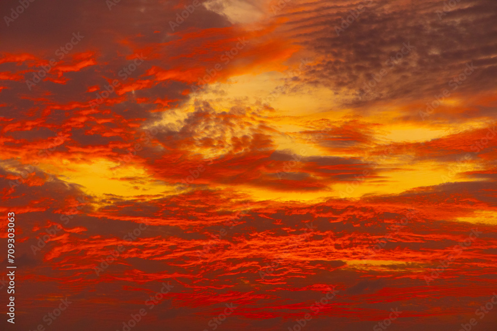 Attractive dramatic red sunset with cloudy sky