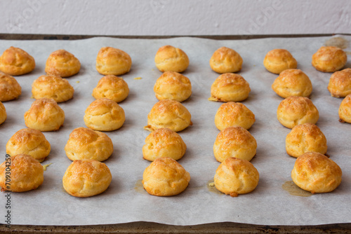 Choux pastry balls with cheese, gougères. French gastronomy photo