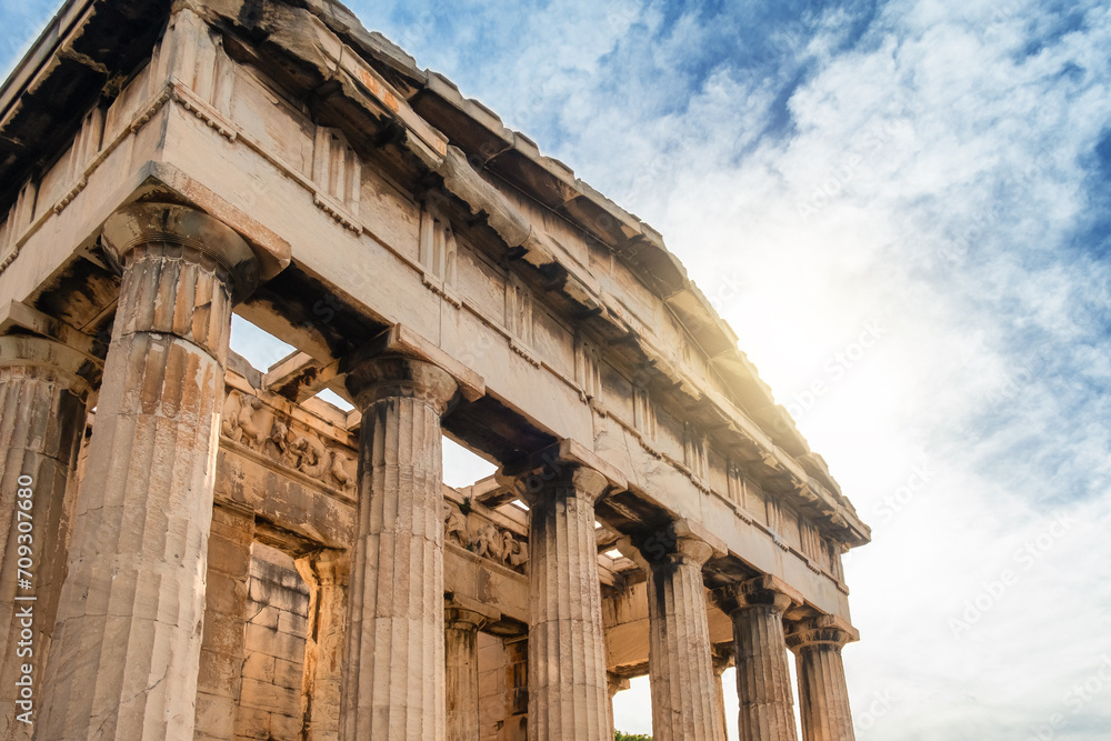 Temple of Hephaestus with Doric colonnade in Ancient Agora, Athens, Greece. Ancient Greek architecture. Popular travel destination Temple of Hephaestus with Doric colonnade in Ancient Agora, Athens, Greece. Ancient Greek architecture. Popular travel destination