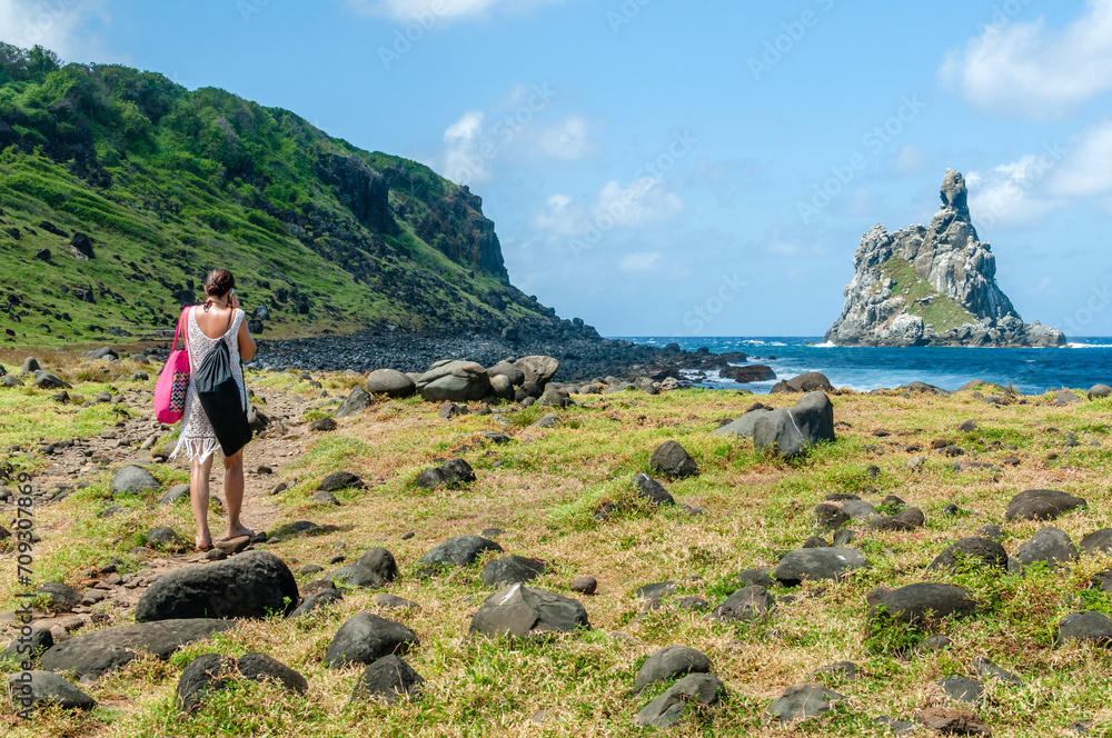 Atalaia beach where there is a natural coral pool and in the background the rock known as the Finger of God in the Fernando de Noronha Archipelago