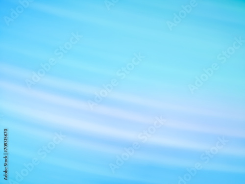 Shiny white beam on blue air defocused bright lights background