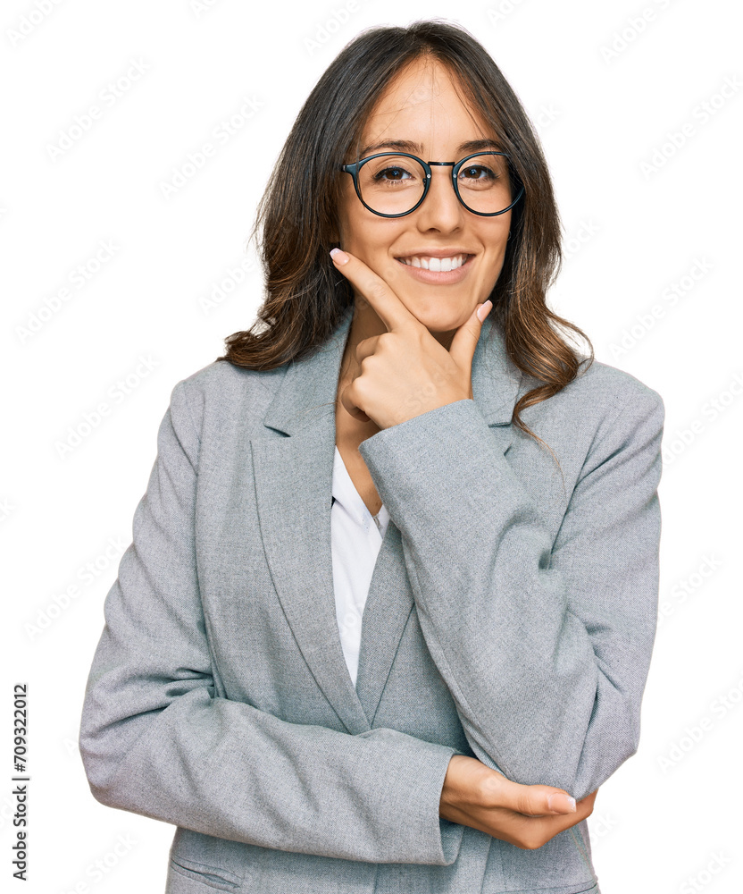 Young brunette woman wearing business clothes looking confident at the camera smiling with crossed arms and hand raised on chin. thinking positive.