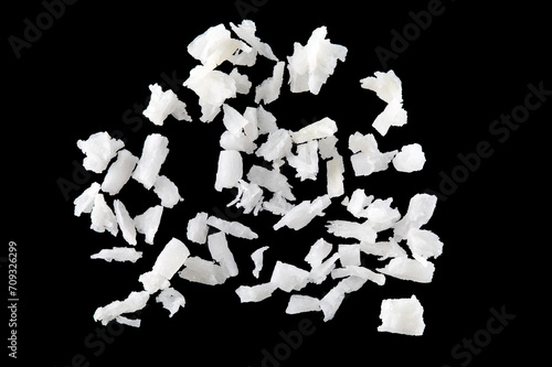 Wallpaper Mural Fresh coconut flakes on black background, top view. Close-up Torontodigital.ca