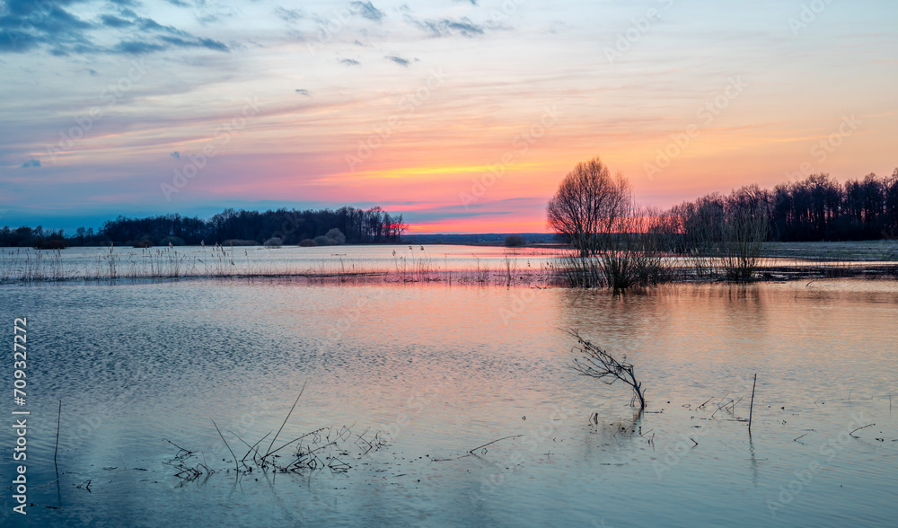 Rural flooding at sunset, flooded farmland Rural flooding at sunset, flooded farmland