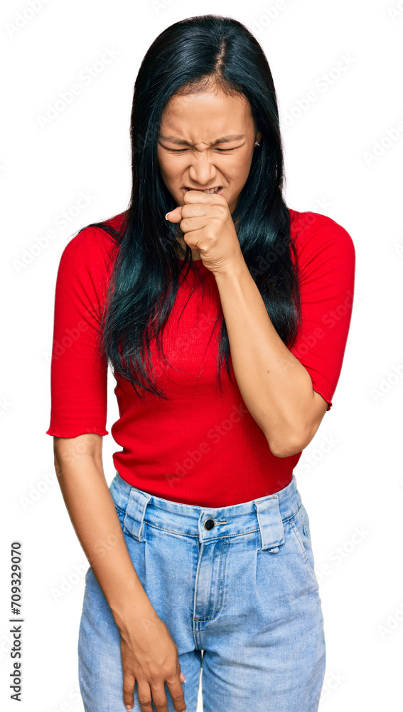 Beautiful hispanic woman wearing casual clothes feeling unwell and coughing as symptom for cold or bronchitis. health care concept. Beautiful hispanic woman wearing casual clothes feeling unwell and coughing as symptom for cold or bronchitis. health care concept.