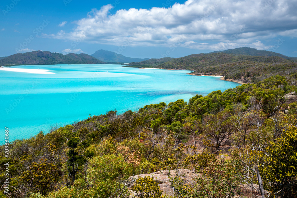 Whitehaven Beach is on Whitsunday Island. The beach is known for its crystal white silica sands and turquoise colored waters. Autralia, Dec 2019