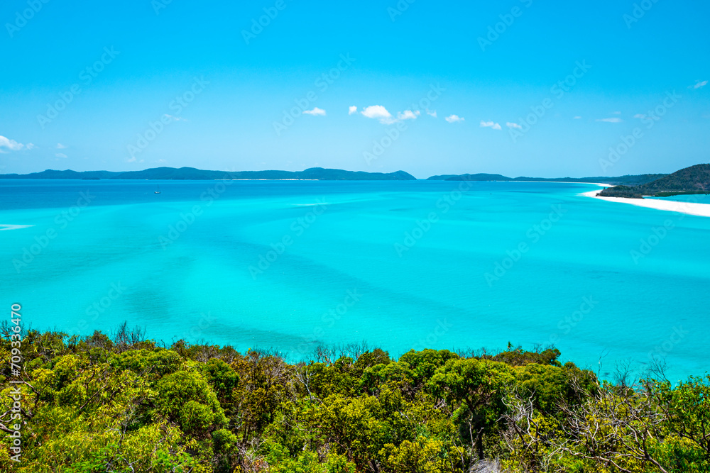 Whitehaven Beach is on Whitsunday Island. The beach is known for its crystal white silica sands and turquoise colored waters. Autralia, Dec 2019