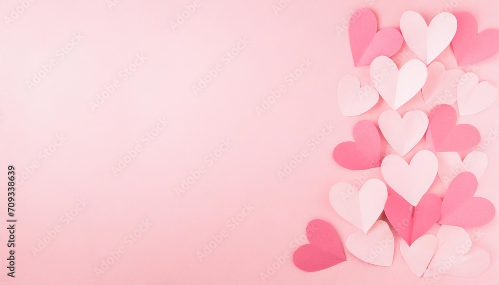 paper valentines day hearts on pink