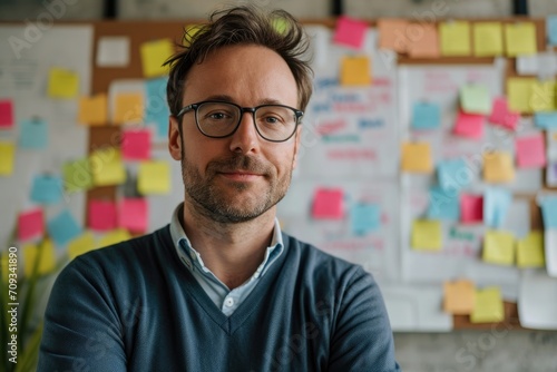 Inspiring studio portrait of a European businessman as a startup mentor, with brainstorming notes and a collaborative workspace, nurturing new businesses and entrepreneurial talent