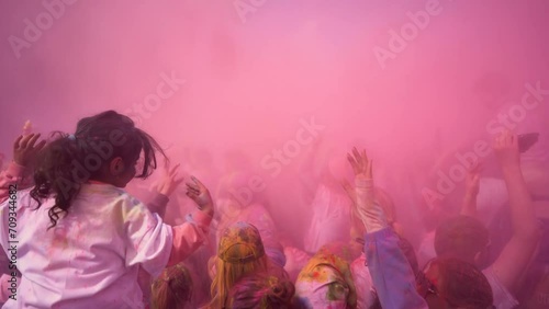 People celebrating holi festival with colors. Holi is a festival of India. 
