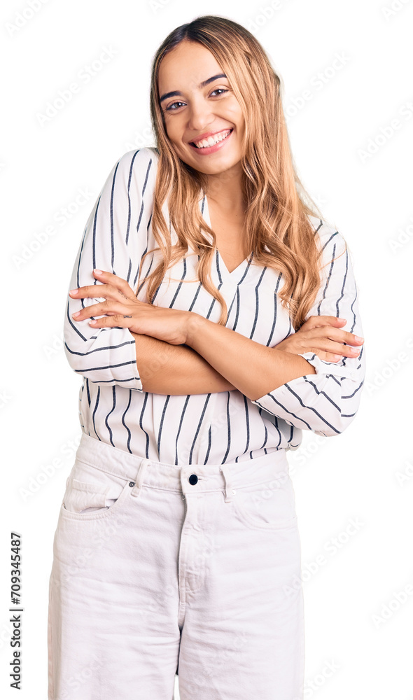 Young beautiful blonde woman wearing casual clothes happy face smiling with crossed arms looking at the camera. positive person. Young beautiful blonde woman wearing casual clothes happy face smiling with crossed arms looking at the camera. positive person.