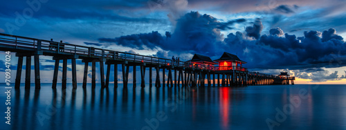 famous old bridge in florida - travel concept of famous pier near naples in florida usa at sunset - travel concept photo