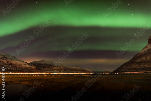 Aurora Borealis over the Lyngenfjord in arctic Norway photo