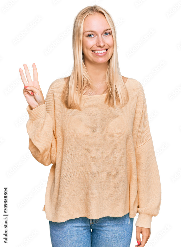 Young blonde girl wearing casual clothes showing and pointing up with fingers number three while smiling confident and happy. Young blonde girl wearing casual clothes showing and pointing up with fingers number three while smiling confident and happy.