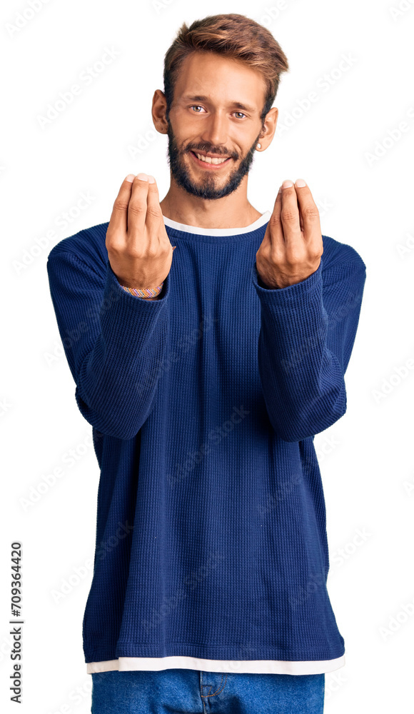 Handsome blond man with beard wearing casual sweater doing money gesture with hands, asking for salary payment, millionaire business Handsome blond man with beard wearing casual sweater doing money gesture with hands, asking for salary payment, millionaire business