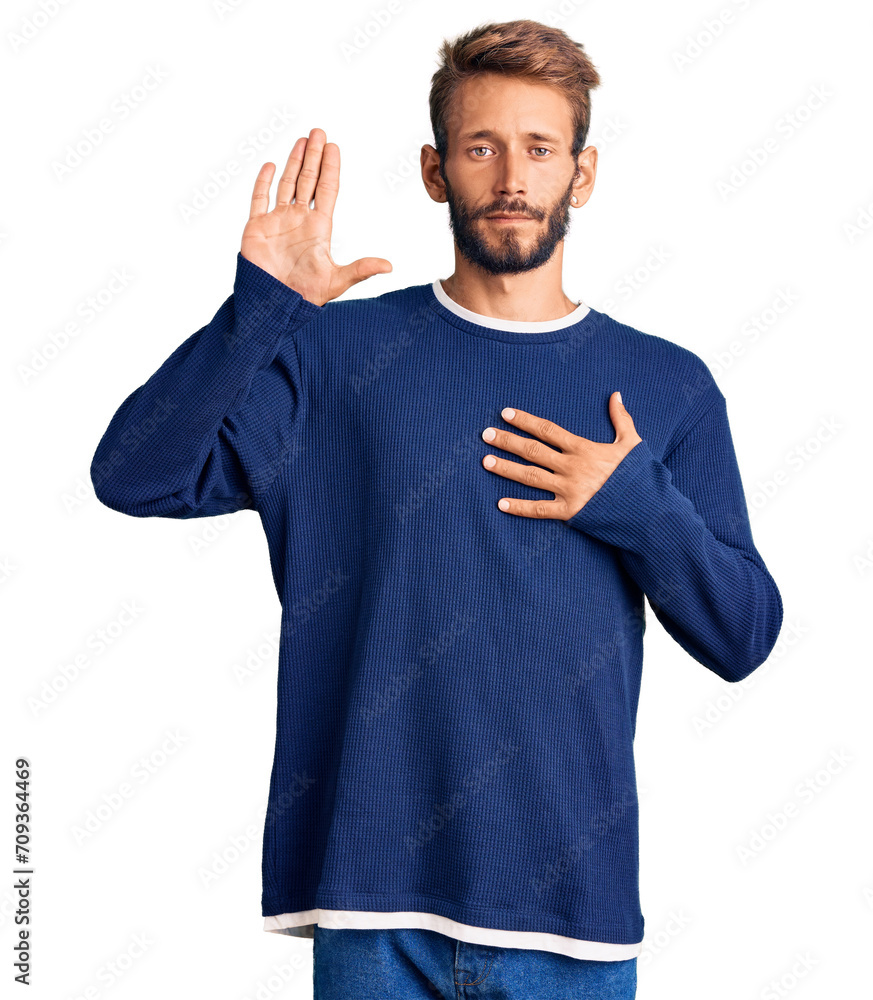 Handsome blond man with beard wearing casual sweater swearing with hand on chest and open palm, making a loyalty promise oath Handsome blond man with beard wearing casual sweater swearing with hand on chest and open palm, making a loyalty promise oath