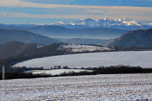 Winter hilly landscspe in January photo