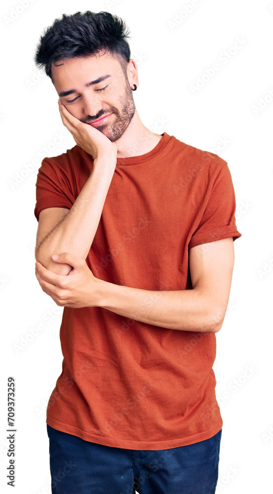 Young hispanic man wearing casual clothes thinking looking tired and bored with depression problems with crossed arms. Young hispanic man wearing casual clothes thinking looking tired and bored with depression problems with crossed arms.