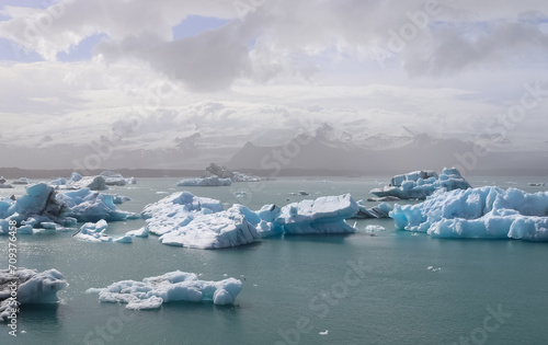 Iceland, Jokulsarlon Lagoon, Turquoise icebergs floating in Glacier Lagoon on Iceland. © Michael