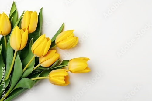 bouquet of beautiful yellow tulips on white background  flat lay and copy space - generative ai