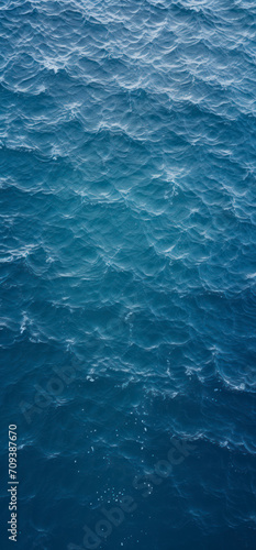 Top view of blue frothy sea surface. Shot in the open sea from above. © Rafa Fernandez