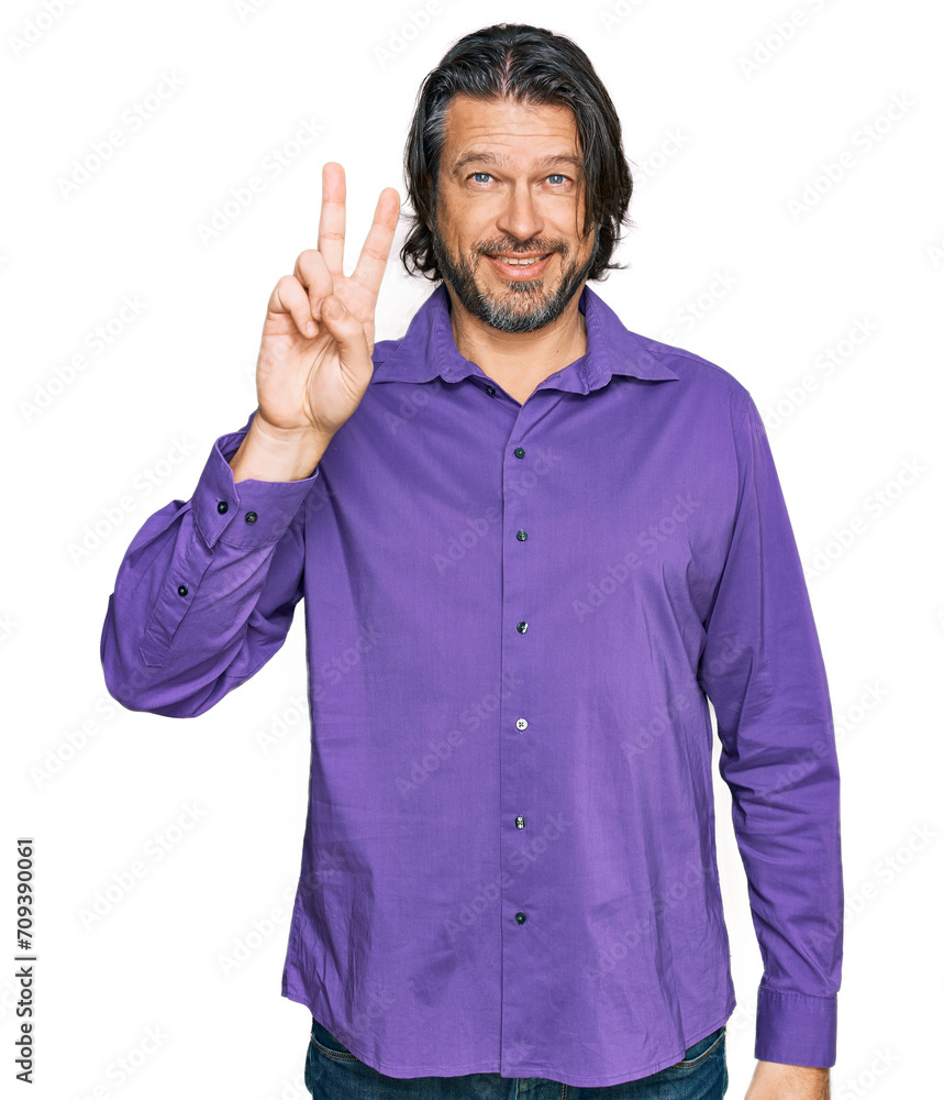 Middle age handsome man wearing business shirt showing and pointing up with fingers number two while smiling confident and happy. Middle age handsome man wearing business shirt showing and pointing up with fingers number two while smiling confident and happy.