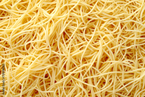 Close up of spaghetti noodles, thin and yellow