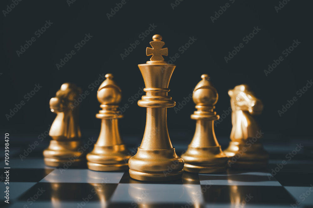 The set of golden chess pieces element is on the chalkboard.chess board game concept of business ideas and competition and stratagy plan success meaning The set of golden chess pieces element is on the chalkboard.chess board game concept of business ideas and competition and stratagy plan success meaning