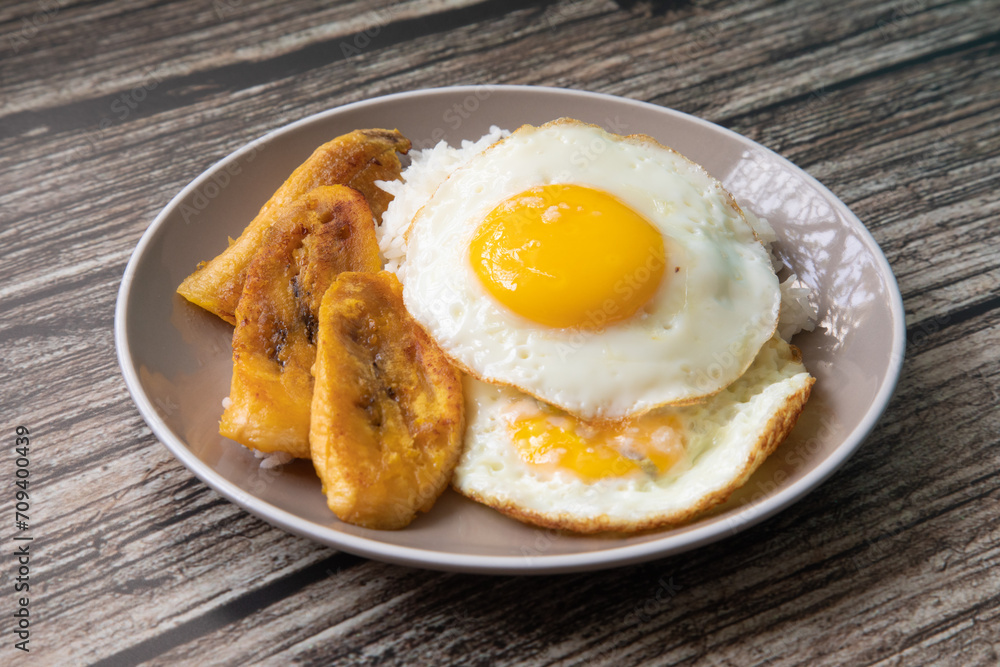 White rice with english fried egg and fried bananas cuban food simple comfort food White rice with english fried egg and fried bananas cuban food simple comfort food