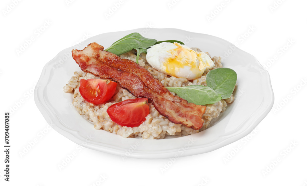 Delicious boiled oatmeal with poached egg, bacon and tomato isolated on white Delicious boiled oatmeal with poached egg, bacon and tomato isolated on white