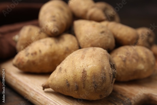 Tubers of turnip rooted chervil on table  closeup
