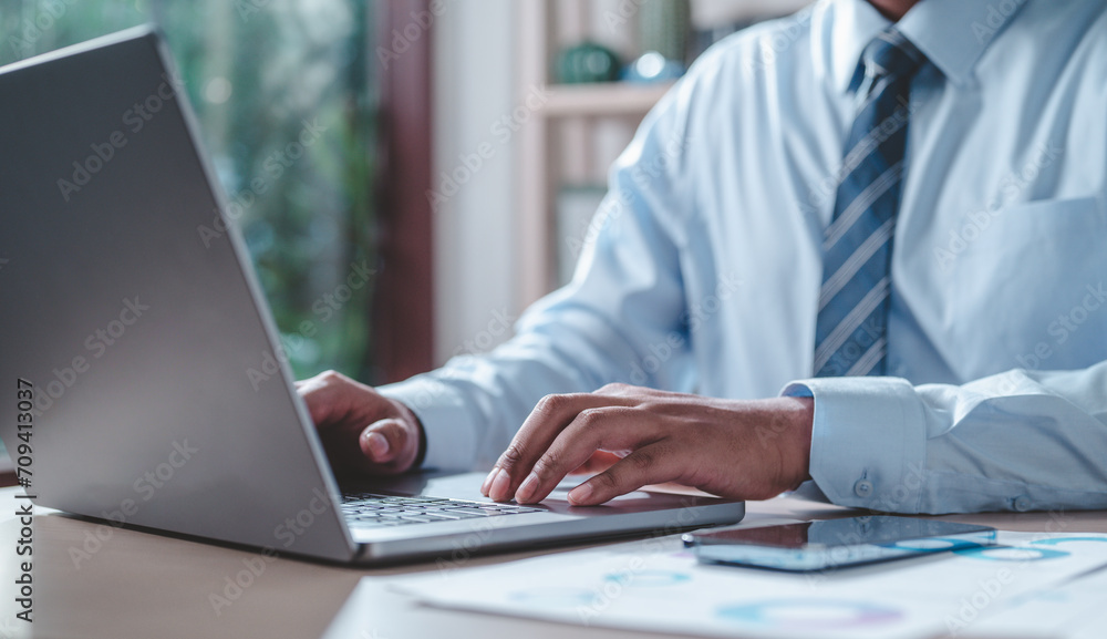 business, chart, pie, graph, investment, finance, diagram, pie chart, financial, growth. businessman putting casual suit typing keyboard with pie chart document showing company financial information. business, chart, pie, graph, investment, finance, diagram, pie chart, financial, growth. businessman putting casual suit typing keyboard with pie chart document showing company financial information.