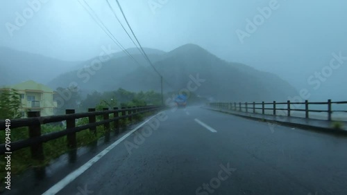 Driving In Torrential Rain In Outer Bands Of Hurricane - Haishen photo