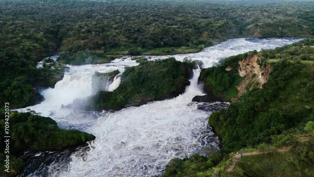 Aerial view backwards away from the Kabalega waterfall, in sunny Uganda, Africa Aerial view backwards away from the Kabalega waterfall, in sunny Uganda, Africa