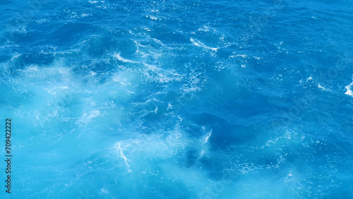 Blue sea marine ocean seascape tropical huge wave on blurred background. Seascape blue ocean white wave motion outdoor. Aqua marine huge wave sea summer background. Paradise turquoise water landscape photo