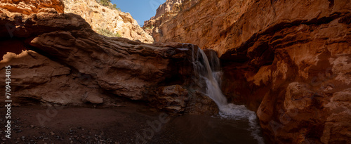 Panorama Of Strong Waterfall In The Red Rocks Of Capitol Reef