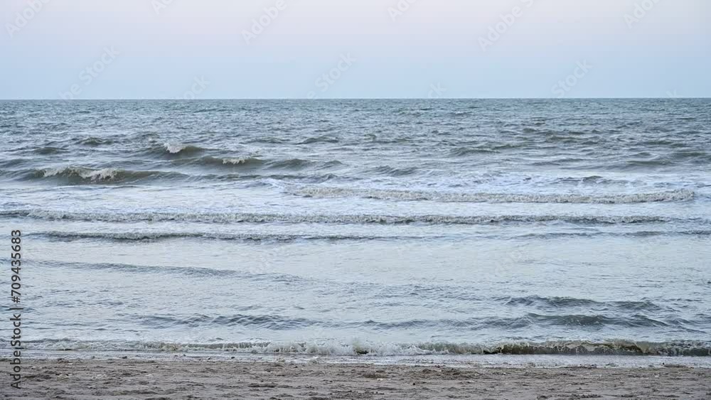slow motion water wave on sea and sand lanscape with blue sky, beautiful natural background slow motion water wave on sea and sand lanscape with blue sky, beautiful natural background