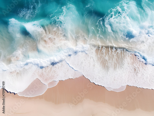 Aerial view of beautiful sandy beach with turquoise ocean waves