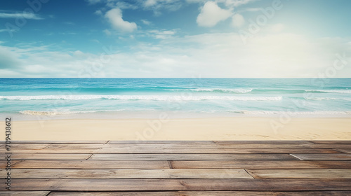 empty wooden planks with blur beach and sea on background © Aura