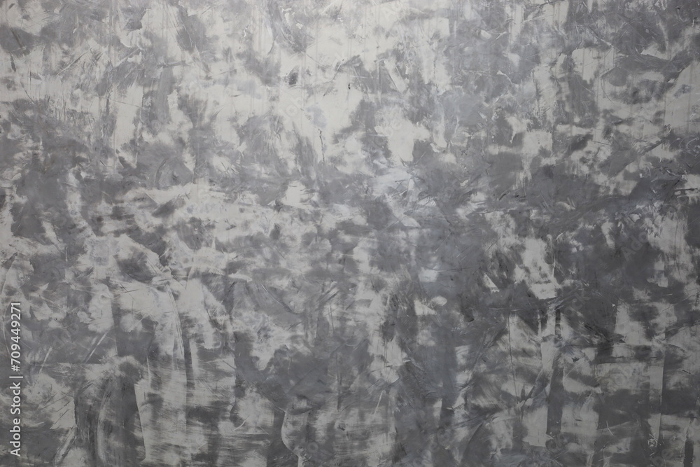 Fototapeta premium Loft cement wall. Loft style gray concrete wall or concrete wall with grunge for abstract background with selective focus.
