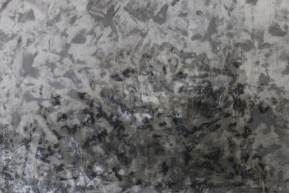 Fototapeta premium Loft cement wall. Loft style gray concrete wall or concrete wall with grunge for abstract background with selective focus.