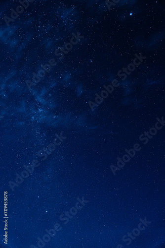 Starry night illuminating the blue sky in the south of Chile
