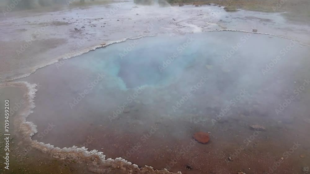 Famous Strokkur Geyser At The Haukadalur Geothermal Area In Iceland - Drone Shot Famous Strokkur Geyser At The Haukadalur Geothermal Area In Iceland - Drone Shot