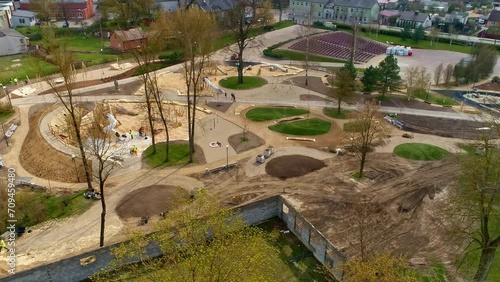 Workers Working At The Children's Playground In Uzvaras Parks Under Construction In Jelgava, Latvia. - aerial shot photo