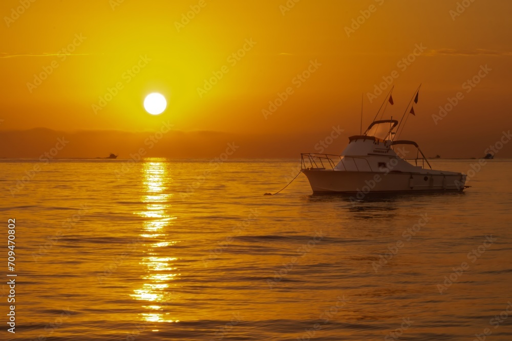 Small fishing boat at sunrise in Baja Mexico